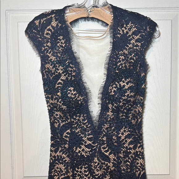 Navy Blue Evening Gown Nude Lining with Lace Overtop Beaded Plunging Neckline - Picture 2 of 16